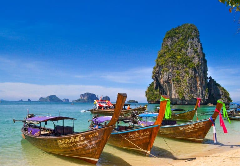 five brown wooden boats krabi