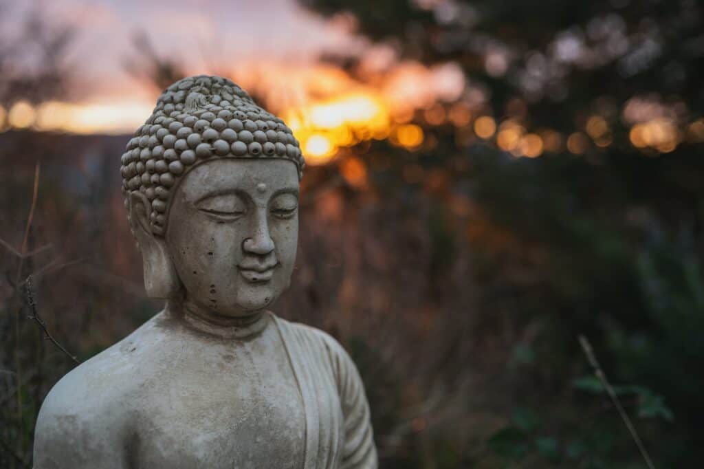 gray concrete buddha statue during daytime