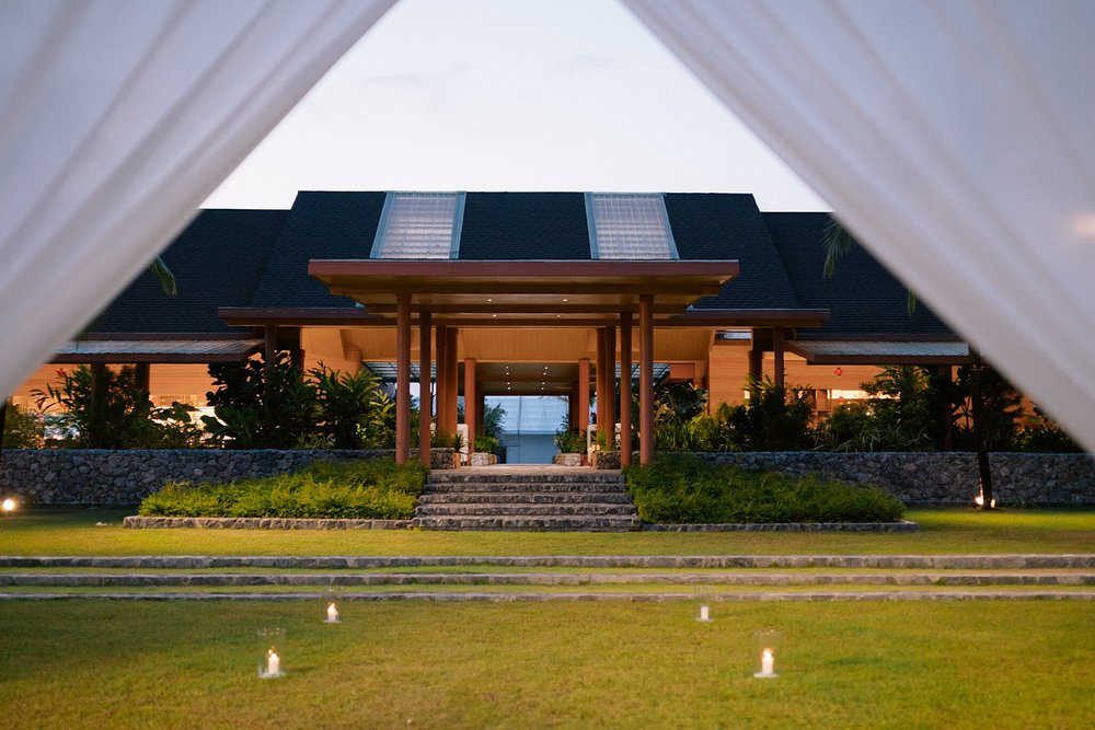 Elegant venue entrance with garden pathway