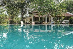 Tropical villa with pool and lush garden