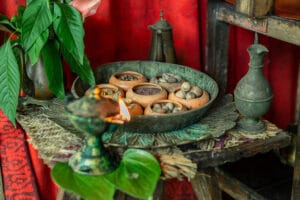 Traditional oil lamp and clay bowls display
