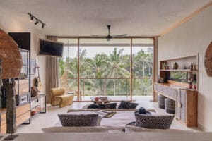 Modern living room with tropical palm view