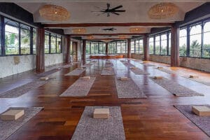 Spacious yoga studio with mats and blocks