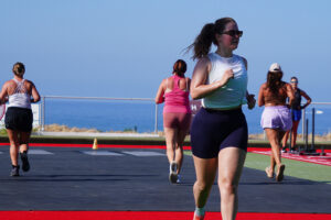 Women jogging outdoors by the oceanfront