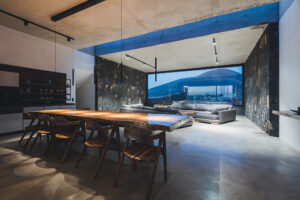 Modern dining and living room with mountain view