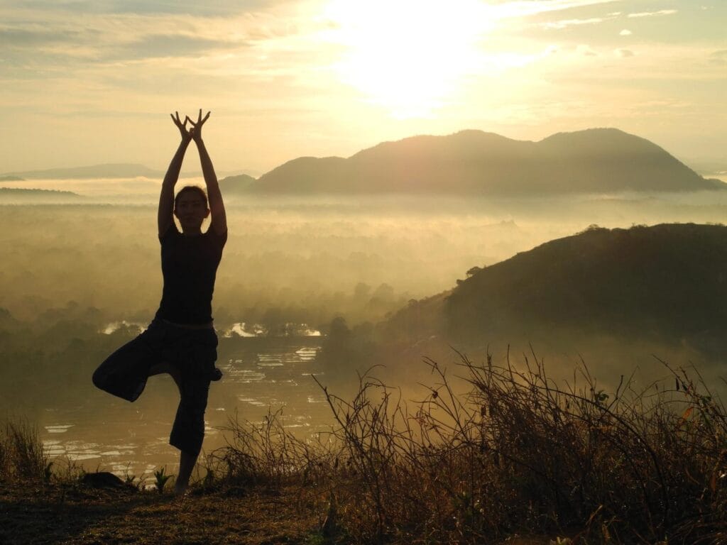 Yoga practice overlooking Ulpotha in Sri Lanka