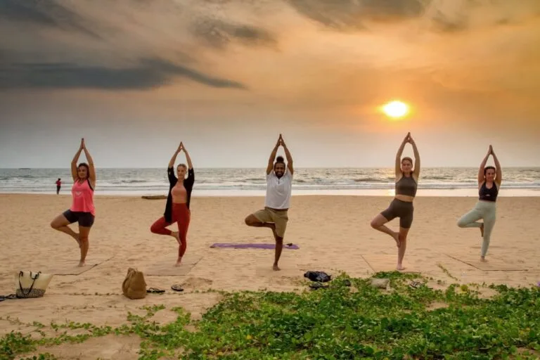 Beach yoga class at YogaBee Retreat Sri Lanka near Bentota